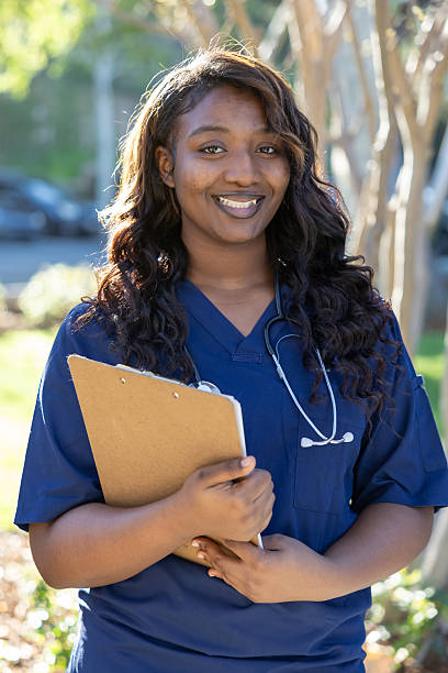 nursing student holding a clipboard